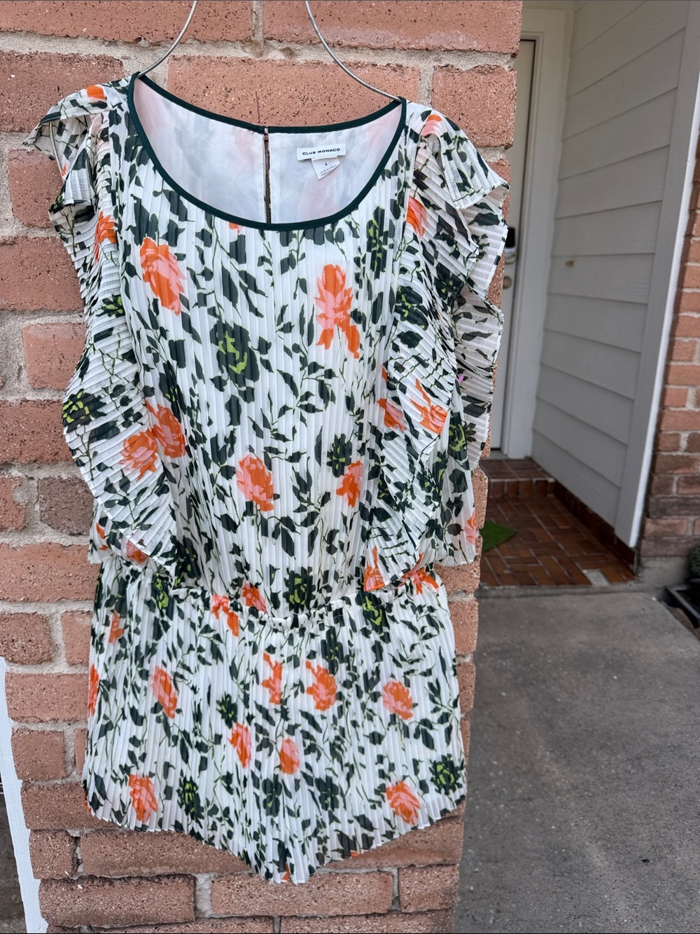 Club Monaco  White Floral Pleated Romper with Orange & Green Print